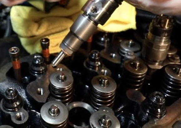 replace injector on cummins 5.9