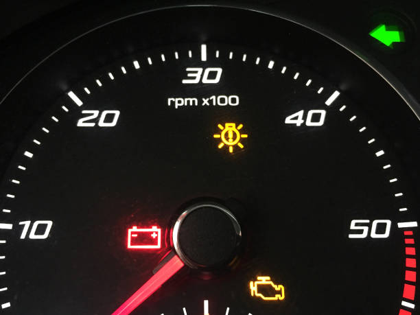Headlight and car check engine sign lights on the car indicator