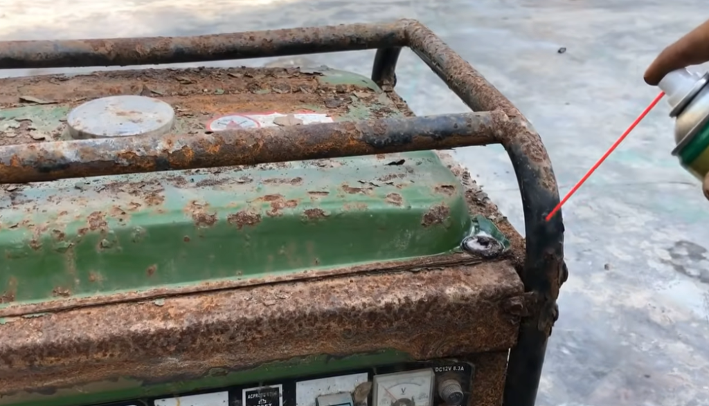 Demo of rust prevention steps for winter generator storage, including spraying inhibitor on exposed metal parts of the generator.